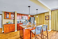 Honua Kai Konea 439 - A center island and open layout make this kitchen perfect for prepping snacks, cocktails,
