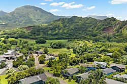 Hale Kanani Steps to Hanalei Bay  - Hanalei's ridgeline wraps the valley in green, homes scattered along the flat below.