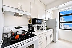Waikiki Banyan 3313 Tower 1 - Whip up delicious home-cooked meals in this fully equipped, sunlit kitchen featuring ample
