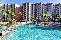 Kaanapali Shores Oceanview Condo - A spacious multi-level resort building with private balconies overlooks a sparkling swimmi