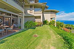 Kapalua Ridge Villas 1614 - There is a large grass area adjacent to the lanai, which provides extra space for you and