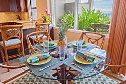 Kapalua Ridge Villas 1614 - The dining area features a beautiful table, large enough to seat four