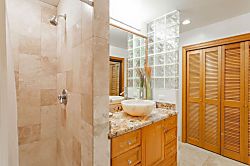Kapalua Ridge Villas 1924 - Gold remodeled guest bath-shower, granite counter, custom sink, washer/dryer and toilet