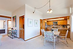 Kapalua Ridge Villas 1924 - Dining table off kitchen features ocean views dreams are made of
