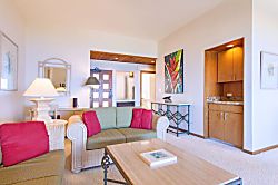 Kapalua Ridge Villas 1924 - Splashes of red-accent pillows match the colors of the evening sky