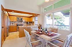 Kapalua Ridge Villas 1924 - The dining table sits up to four people and features beautiful ocean views