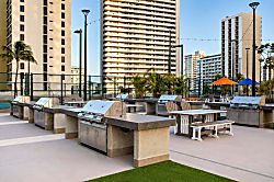 Waikiki Banyan Plumeria Suite - Recreation deck offers so much for the whole family to enjoy, including a sparkling swimmi
