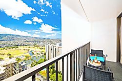 Waikiki Banyan 3401 T2 - Relax on the balcony with city and mountain views in this modern space.