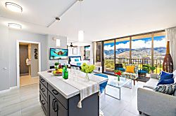 Waikiki Banyan 3401 T2 - Modern open living space with a balcony offering mountain views