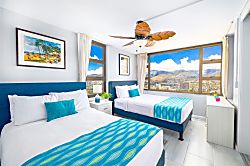 Waikiki Banyan 3401 T2 - Bright bedroom with two queen beds and panoramic city and mountain views