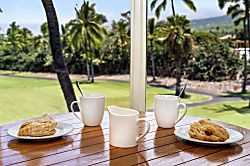 Kanaloa at Kona 1606 - Morning coffee and something sweet, the fairway greening up past the rail.