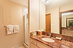 Kapalu Ridge Villa 2914 - The full, remolded guest bathroom features a shower, sink and washer and dryer