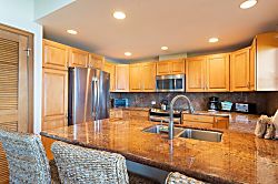 Kapalu Ridge Villa 2914 - The breakfast bar, with seating for three, is the perfect place for coconut pancakes and m