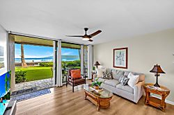 Kulakane 105 - Comfortable seating paired with stunning lawn and ocean views.