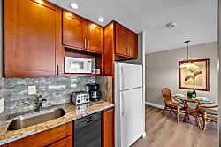 Kulakane 105 - Fully equipped kitchen with modern appliances and ample counter space.