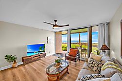 Kulakane 105 - Relaxing coastal living room overlooking lush lawns and the Pacific.