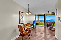 Kulakane 105 - Intimate dining space overlooking lush lawns and the ocean.