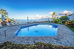 Napili Point NAP-C42 - Napili Point pool with ocean views, lush landscaping, and a signature sea turtle mosaic, a