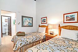 Napili Point NAP-C42 - Comfort meets island charm with twin beds, natural wood tones, curated art, and a cozy, li