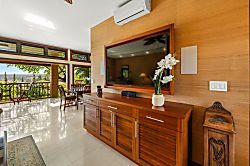 Kapalua Ridge Villas 1412 - The living room features a large flat screen TV