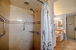 Papakea A301 - Step into a tiled shower designed for everyday ease and relaxation.