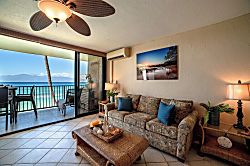 Papakea A301 - Relax in a bright living room that opens seamlessly to the sea.