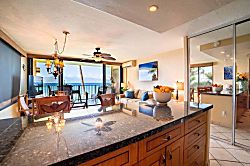 Papakea A301 - Unwind in an open living space with ocean views just beyond the balcony.