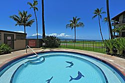 Papakea A301 - Relax in a mosaic‑lined pool where dolphins dance beneath the water.