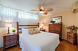 Papakea A301 - Rest easy in a cozy bedroom with tropical décor and modern comforts.