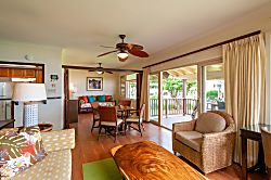 Hanalei Colony Resort K4  - The living and dining areas open up onto the large lanai. Leave the screen door open to le