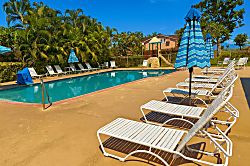 Oceanfront Oasis in Lahaina - Relax at Puamana’s sparkling pool in Lahaina, where lush palms and lounge chairs surround