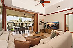 Kolea 11C - Unwind in your spacious living room where natural light floods through open doors to your