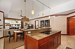 Kolea 11C - Cook and gather in your spacious, modern kitchen featuring granite countertops, elegant pe