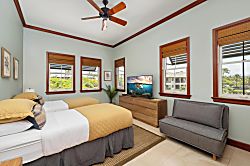 Kolea 11C - Relax in your bright, airy bedroom with twin beds, a cozy sitting area, ceiling fan, and l
