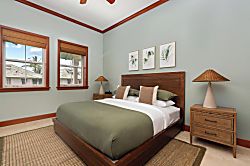 Kolea 11C - Drift off to sleep in this serene bedroom with its tranquil coastal palette, warm wood acc