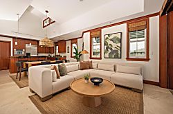 Kolea 11C - Step into your bright, open-concept retreat with soaring ceilings, rich wood accents, and