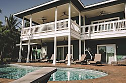 Kihei's Hidden Gem - View of the pool and upper lanai from the backyard