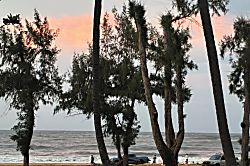 Anahola Beach Home - Sunset on other side of Island reflected in the clouds' changing colors
