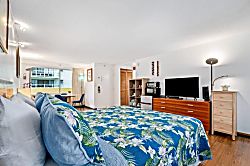 Diamond Head Beach Hotel Studio 404 - Plush bed with fresh linens for restful sleep
