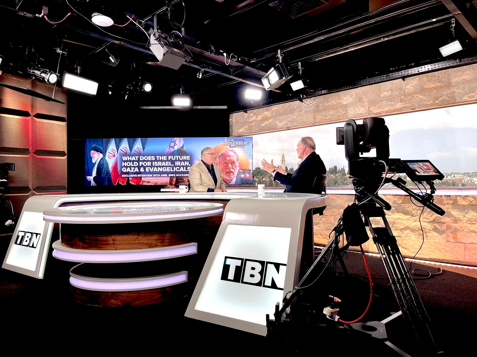 Joel Rosenberg interviews Amb. Mike Huckabee on TBN's The Rosenberg Report. Credit: TBN