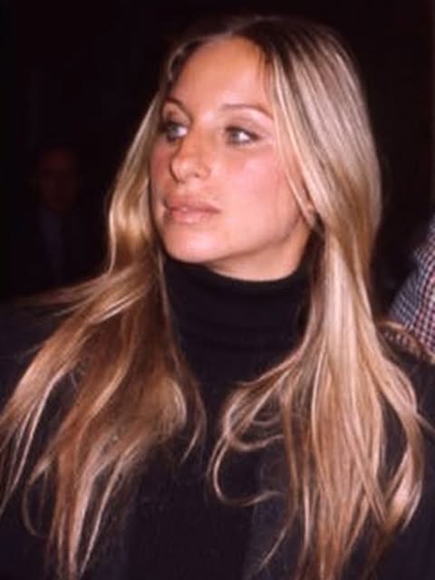 A shot from the 1970s. This is how women are wearing their hair now; I also see many women wearing wigs that look like this today. #TBT