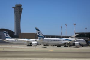 El Al planes parked near terminal 3 and the airport tower control at Ben Gurion International Airport, August 8, 2020. (Photo: Olivier Fitoussi/Flash90)