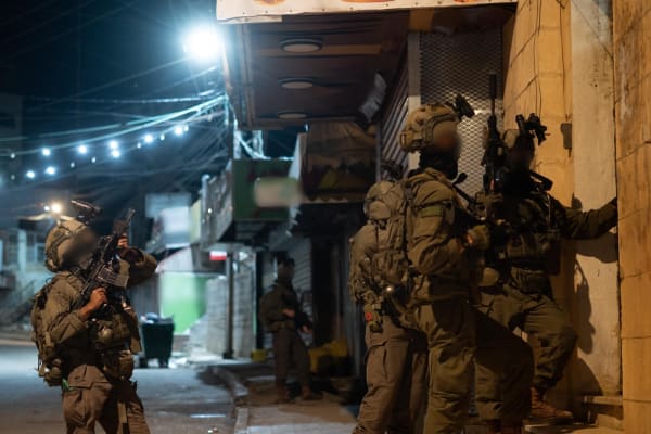 Israeli forces apprehend weapons dealer, crime family members in widespread crackdown across Judea and Samaria