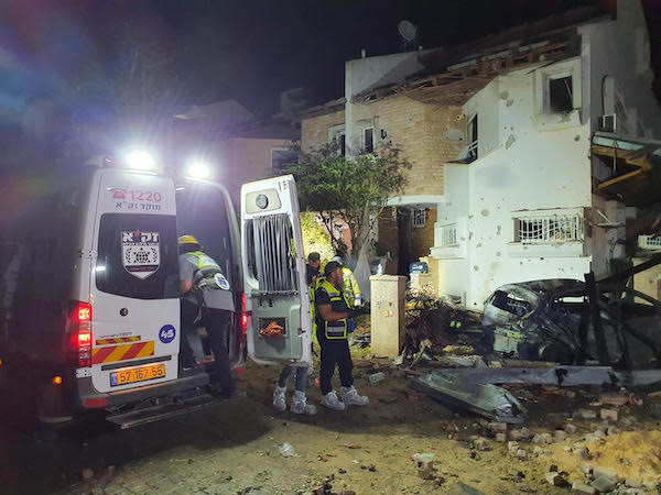 A bus on fire in central Israel after being hit by a rocket from Gaza, May 11, 2021 (Photo: IDF Twitter feed)