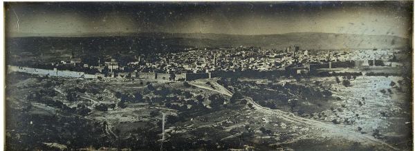 Photo of the Lion's Gate in Jerusalem from 1844 by Joseph-Philibert Girault de Prangey juxtaposed with an image of the same place today (Photo: Edden Ram)