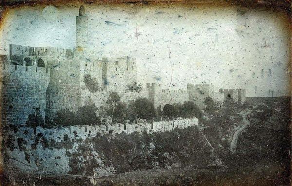 Photo of the Lion's Gate in Jerusalem from 1844 by Joseph-Philibert Girault de Prangey juxtaposed with an image of the same place today (Photo: Edden Ram)