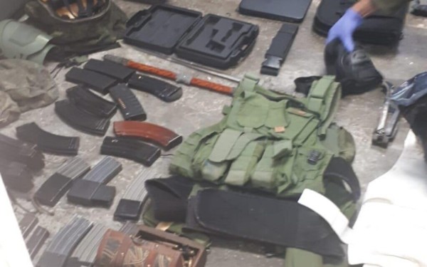 Undated photo of Israeli soldiers arresting a terror suspect thought to be involved in major Hamas cell planning attacks on Israeli targets in the West Bank and Jerusalem. (Photo: Israel Defense Forces)
