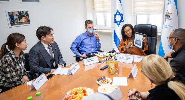 With a family in Ethiopia waiting to make aliyah (Photo courtesy)