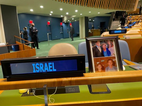 Iran's President Ebrahim Raisi holds up a picture of Quds Force Commander General Qassem Soleimani, who was killed in a U.S. attack, as he addresses the 77th Session of the United Nations General Assembly at U.N. Headquarters in New York, Sept. 21, 2022. (Photo: REUTERS/Brendan McDermid)