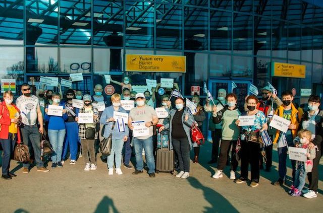 Jewish immigrants at the airport in Almaty, Kazakhstan about to board a flight to Israel (Photo: ICEJ)